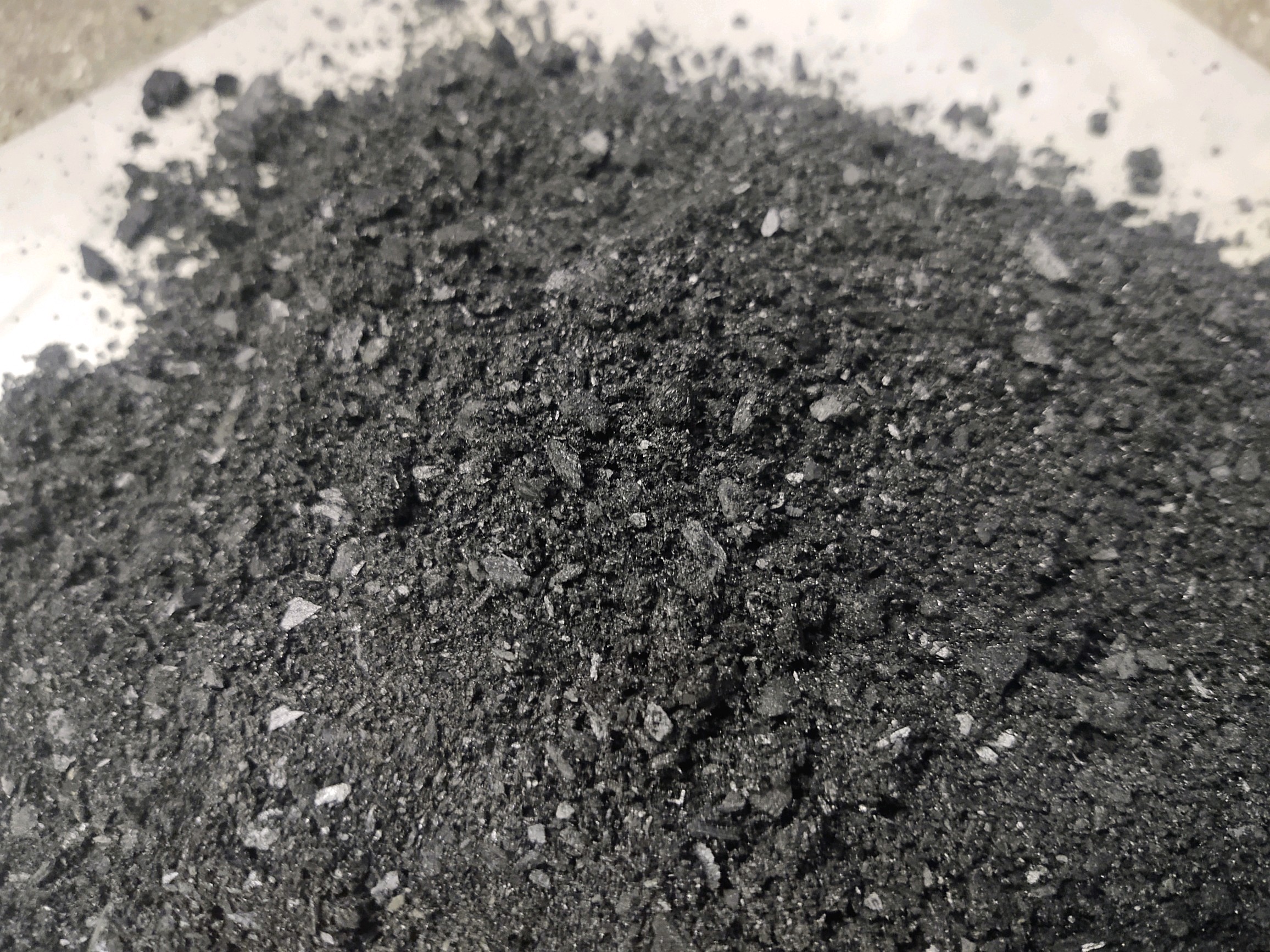 Rice husk charcoal (biochar) for fertilizer.